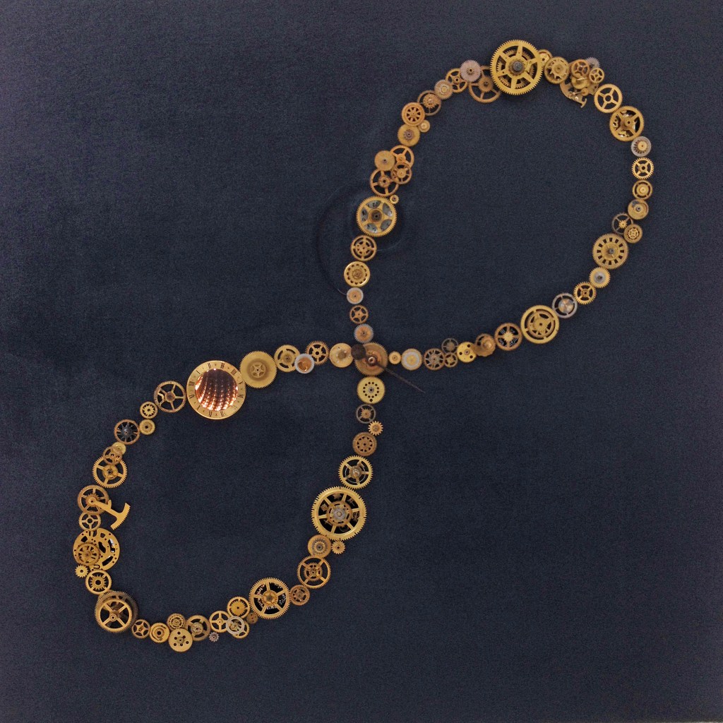 This work underscores how the laws of physics, which apply to our life on Earth, are redundant on a cosmic scale, where space and time become intertwined and observer dependent. The cogs are mostly tied up. A hand is rotating but there are no numbers to mark time. One clock’s face is distorted to expose warped time. Another face presents a tunnel of lights that seem to recede towards an infinite vanishing point. Religions are evoked, referring to our differing beliefs over creation and fate, whilst Mickey Mouse might be as relevant a factor for others. NB: An Analemma describes the sun's positions in relation to Earth over the course of one year. It also evokes the ancestral way of reading time or charting spatial position. Sundials, clocks and compass were subsequently invented to measure time and location more conveniently and finally the GMT was established to synchronise our world.